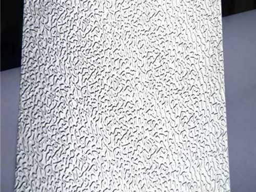 Embossed aluminum heat shield